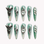 Teal Dragon Eye Nails
