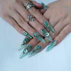 Teal Dragon Eye Nails