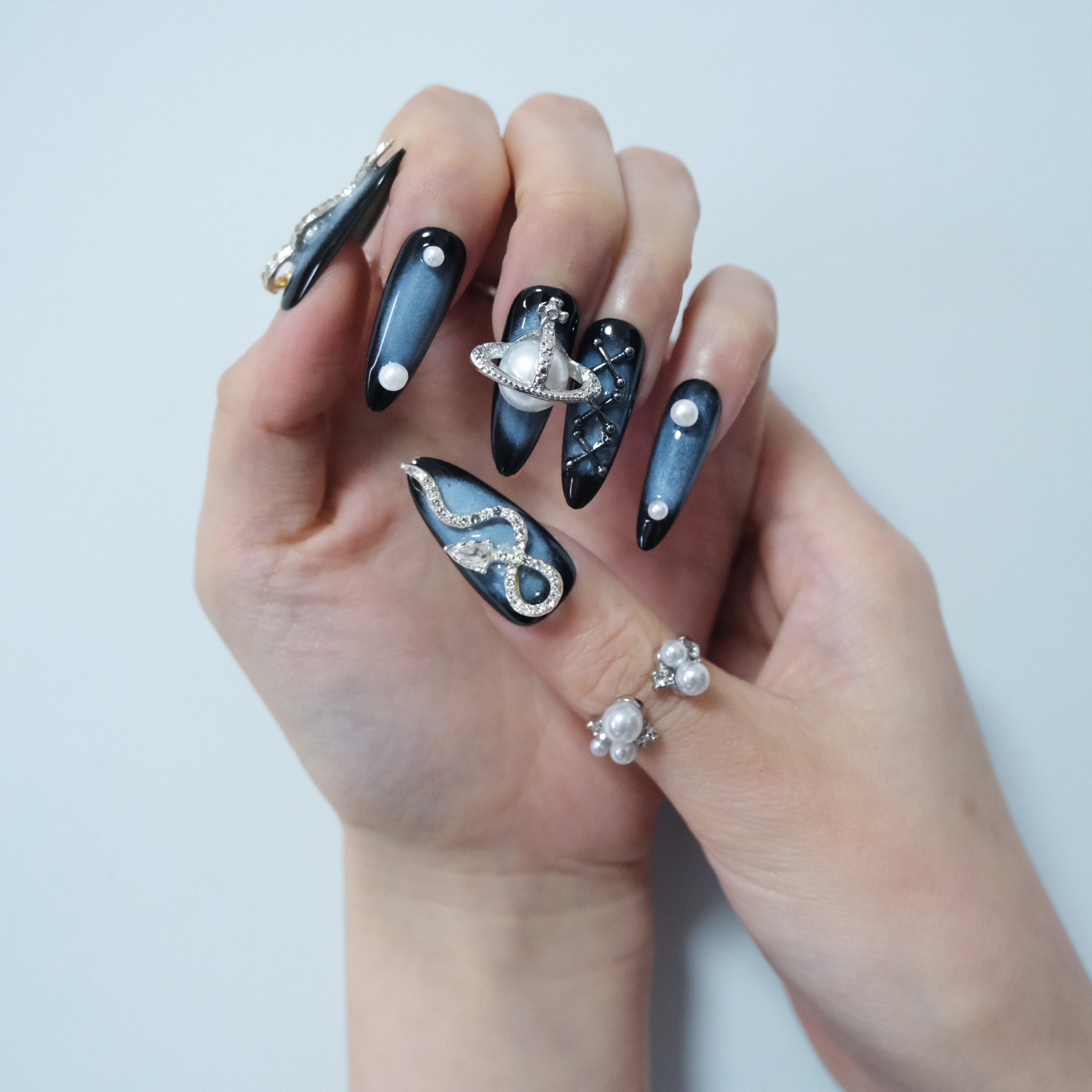 Celestial Saturn Pearl Nails