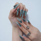 Teal Dragon Eye Nails