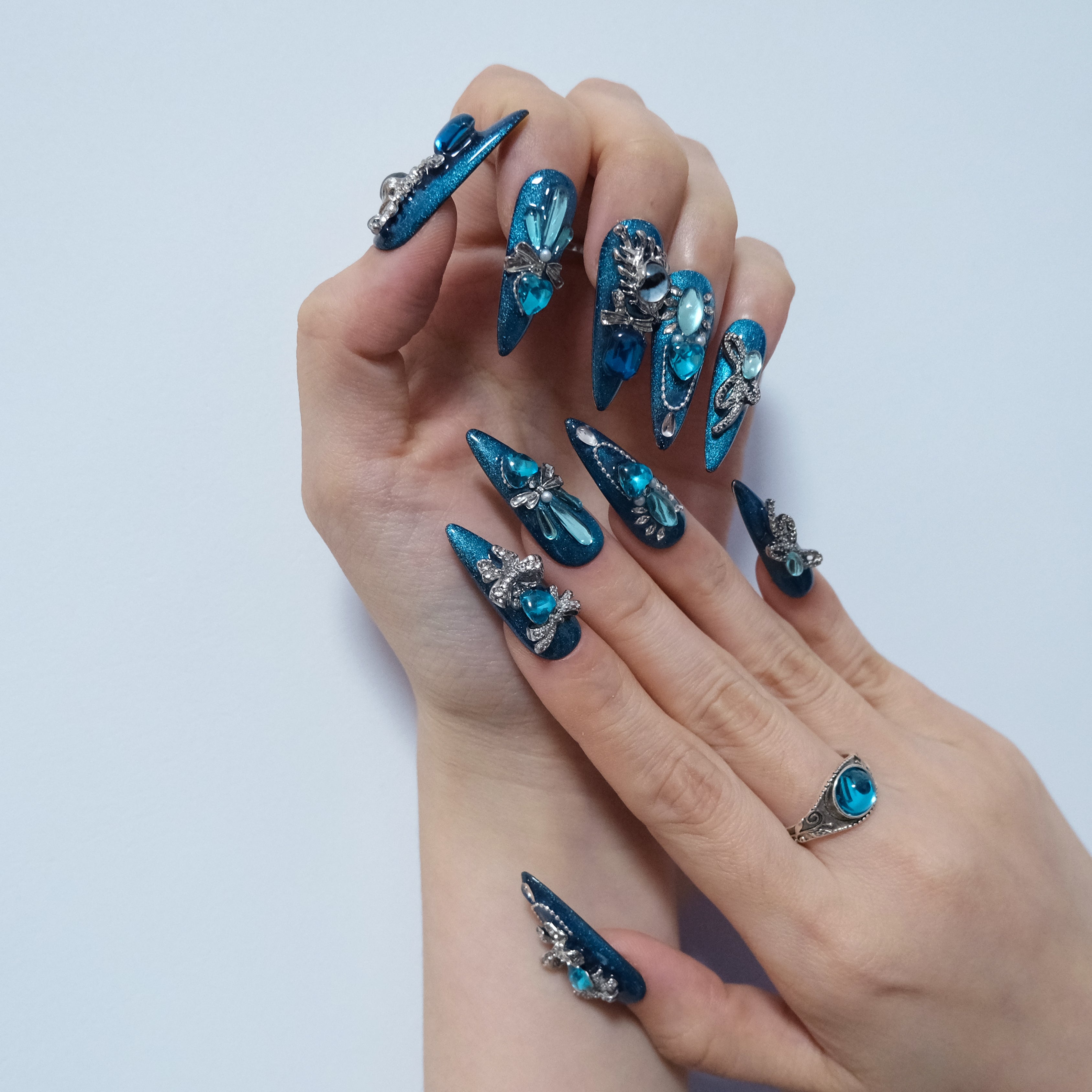 Teal Ocean Gem Nails