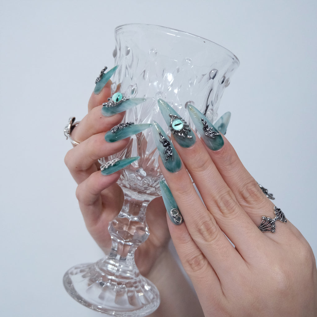 Teal Dragon Eye Nails