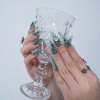 Teal Dragon Eye Nails